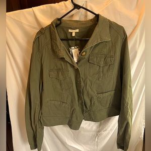 Olive colored jacket.